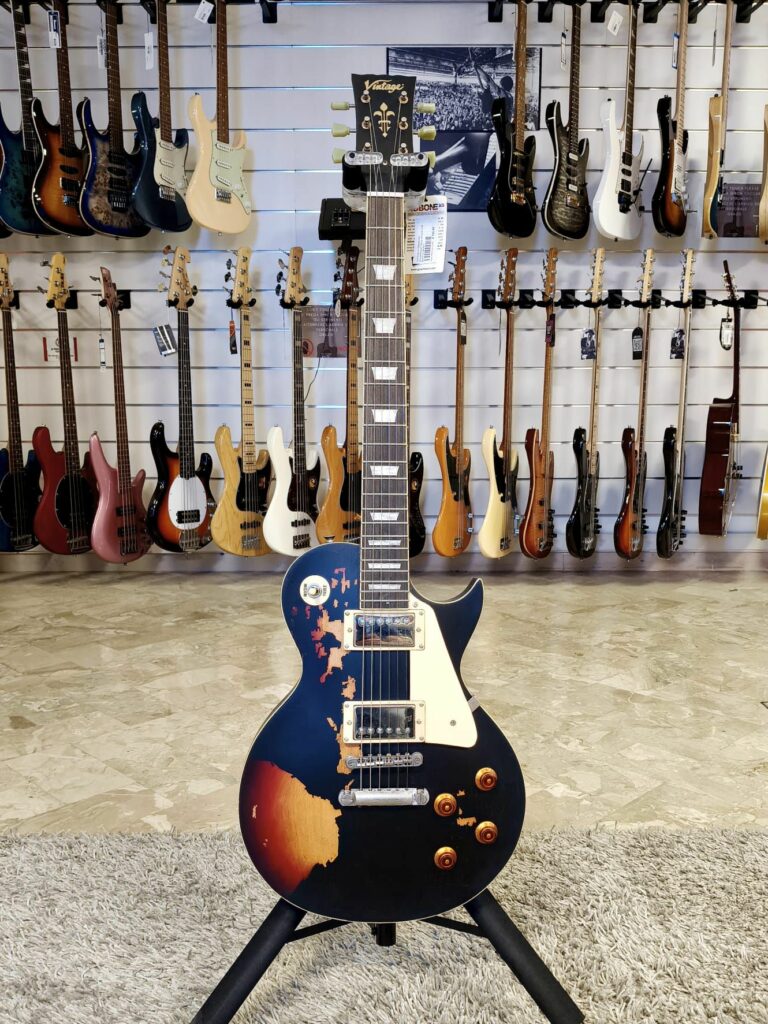 Vintage Les Paul V100 Icon black over sunburst - possibilità di permuta